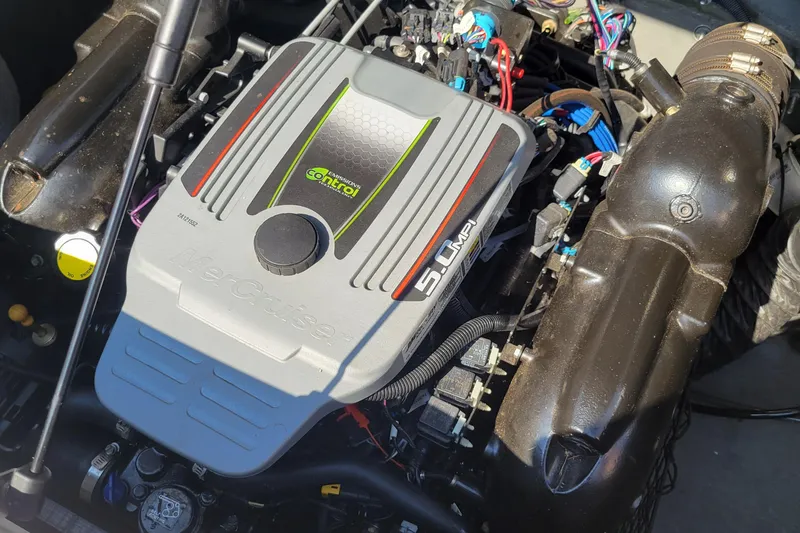 Slide: The Image of 2014 Larson LSR 2100 I/O boat engine close-up. - 8