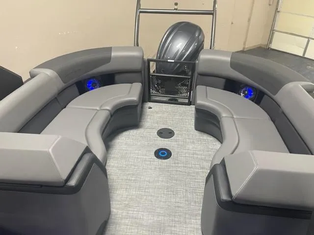 Slide: The Image of 2026 South Bay 525 RS 3.0 Arch boat interior with gray seating and modern design. - 5