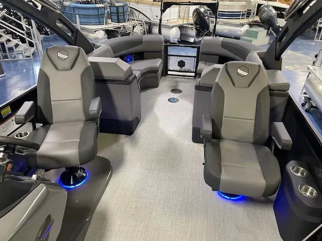 Slide: The Image of Luxurious 2026 South Bay 525 RS 3.0 Arch pontoon boat interior with modern seating and ambient lighting. - 6