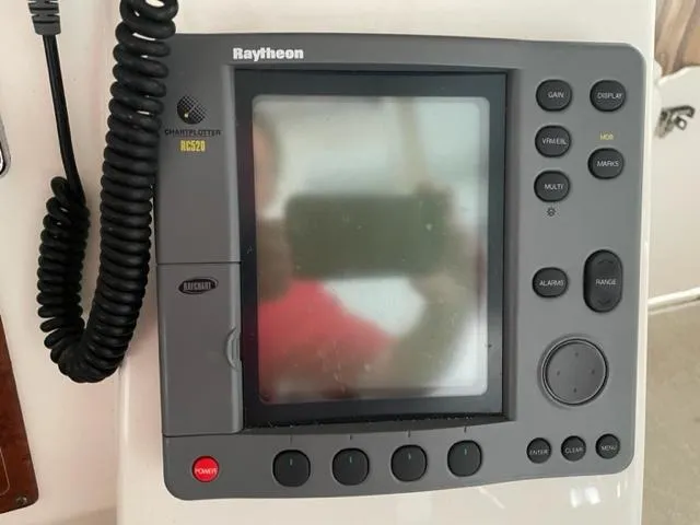 Slide: The Image of Raytheon marine navigation system on 1999 Silverton 392 Motor Yacht. - 16