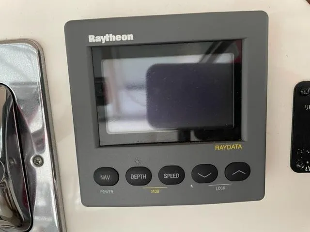 Slide: The Image of Raytheon Raydata display on 1999 Silverton 392 Motor Yacht dashboard. - 17