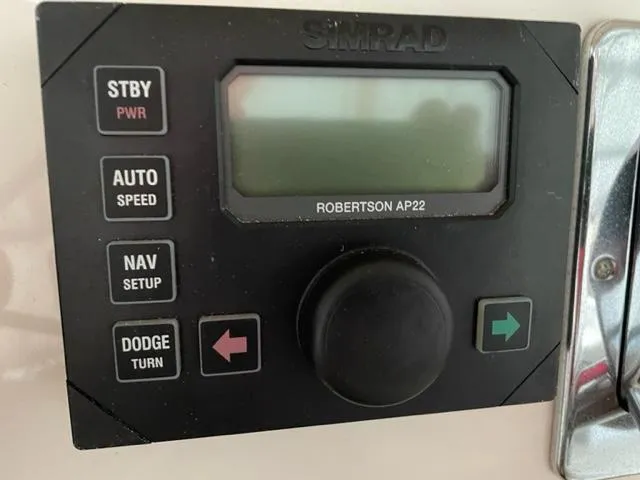 Slide: The Image of Simrad Robertson AP22 autopilot control panel on 1999 Silverton 392 Motor Yacht. - 18