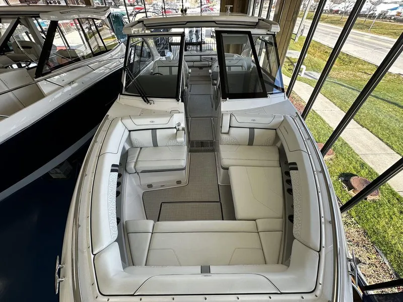 Slide: The Image of 2024 Regal LS36 boat interior with spacious seating and modern design. - 19