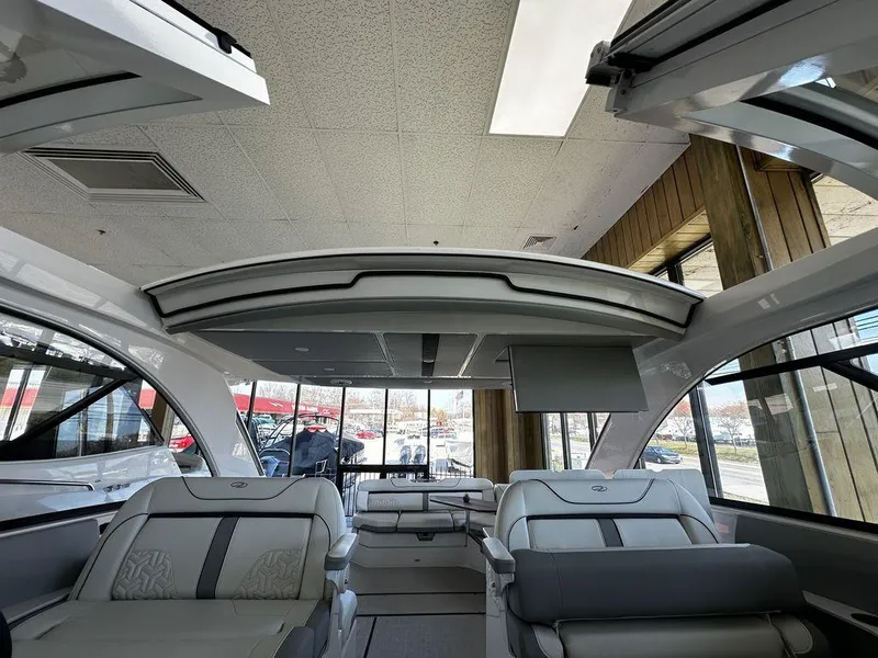 Slide: The Image of Interior of 2024 Regal LS36 boat with luxurious seating and modern design. - 21