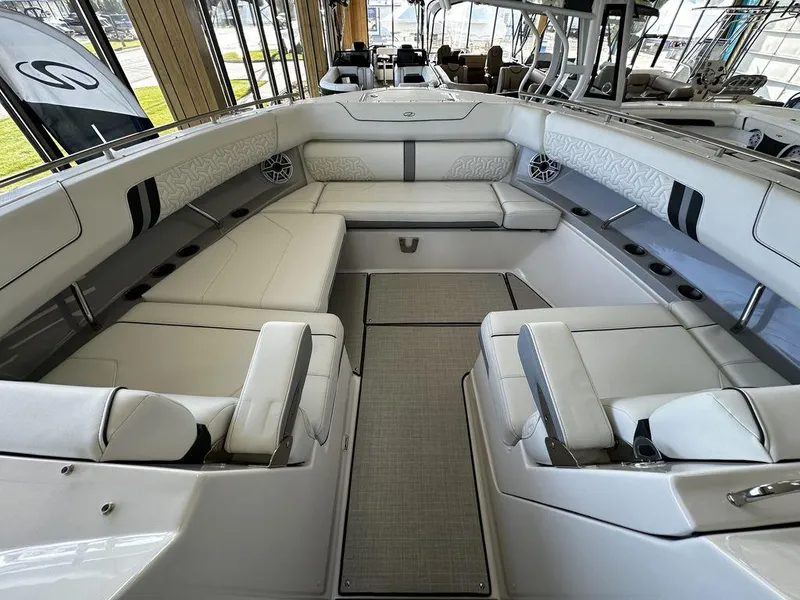 Slide: The Image of 2024 Regal LS36 boat interior with spacious seating and modern design. - 23