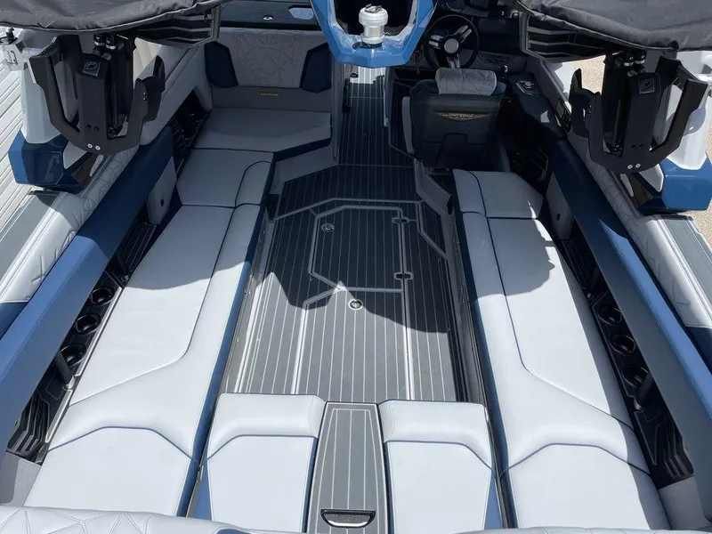 Slide: The Image of 2023 Nautique G25 Paragon interior with luxurious seating and modern design. - 4