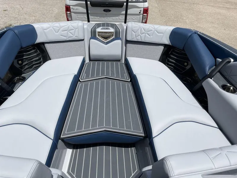 Slide: The Image of 2023 Nautique G25 Paragon boat interior with luxurious seating and modern design. - 5