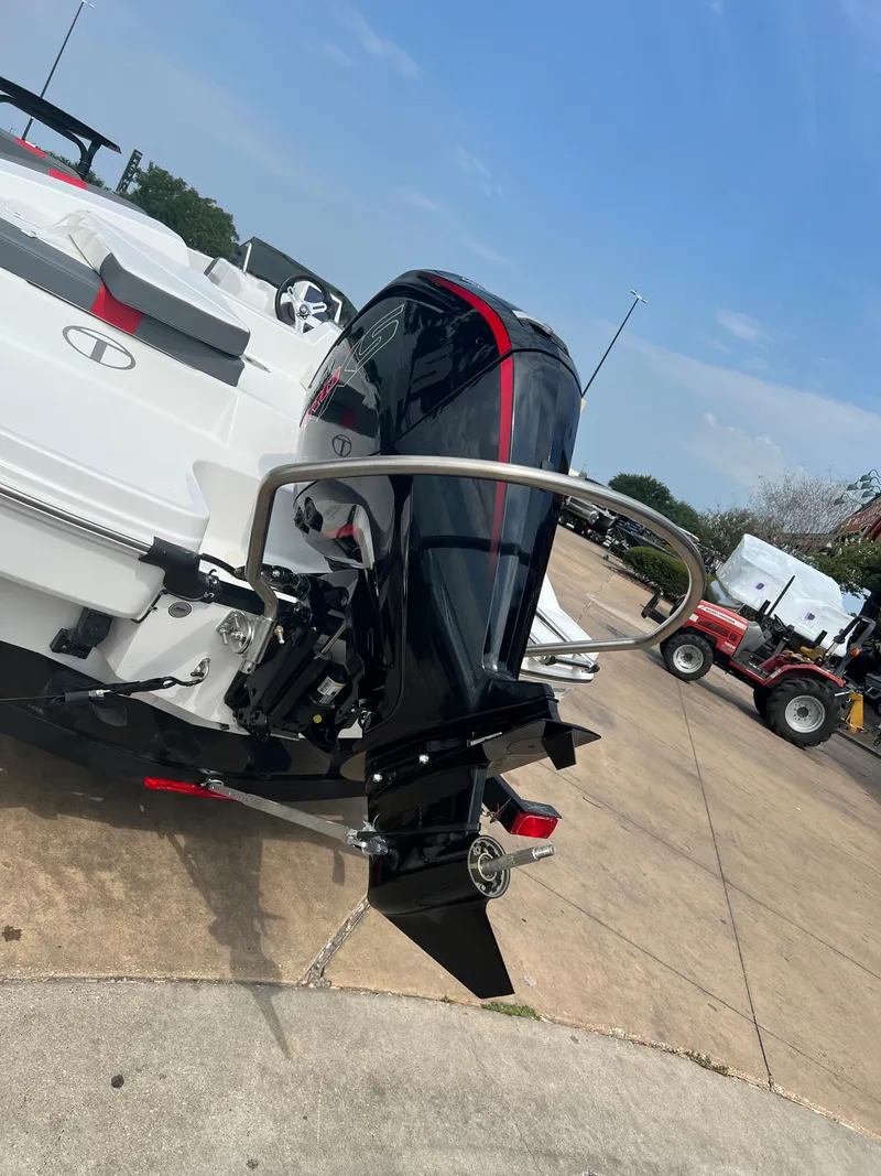 Slide: The Image of 2024 Tahoe T18 boat with outboard motor on a trailer. - 3