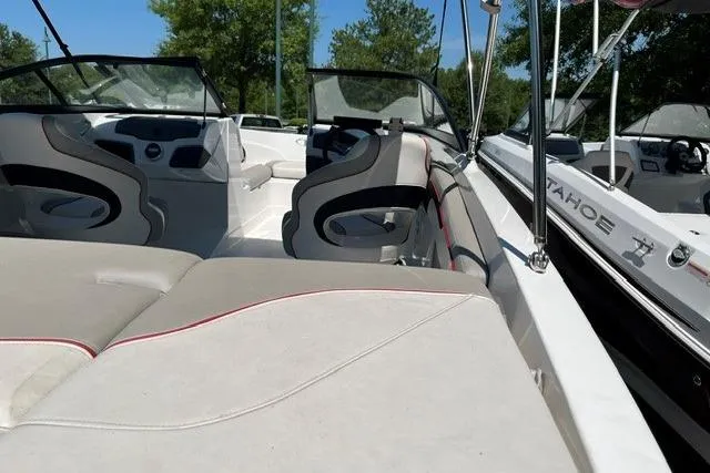 Slide: The Image of 2024 Tahoe 210 Si boat interior with modern seating and sleek design. - 6