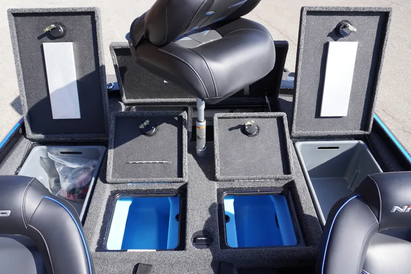 Slide: The Image of 2024 Nitro Z19 boat interior with storage compartments and seating. - 56