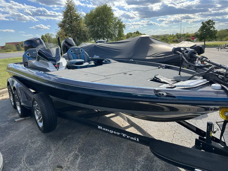 Slide: The Image of 2024 Ranger Z520R Ranger Cup Equipped boat on trailer in outdoor setting. - 2