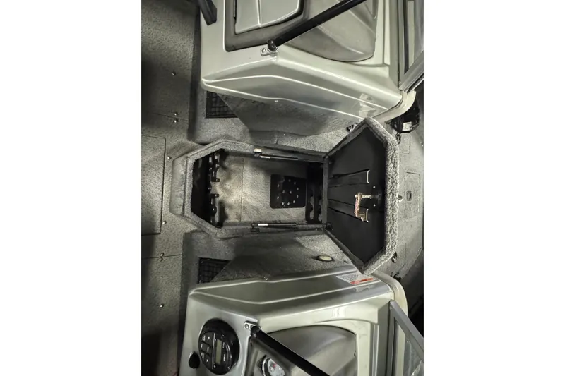 Slide: The Image of 2018 Tracker Targa V-19 WT boat interior storage compartments. - 13