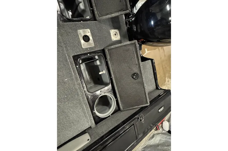 Slide: The Image of 2018 Tracker Targa V-19 WT boat interior storage compartments and features. - 8