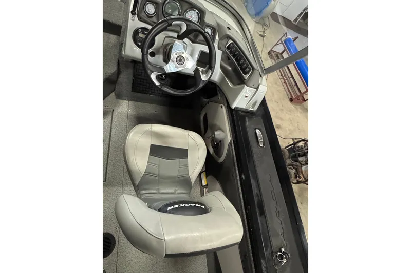 Slide: The Image of Interior of 2018 Tracker Targa V-19 WT boat with steering wheel and seat. - 9