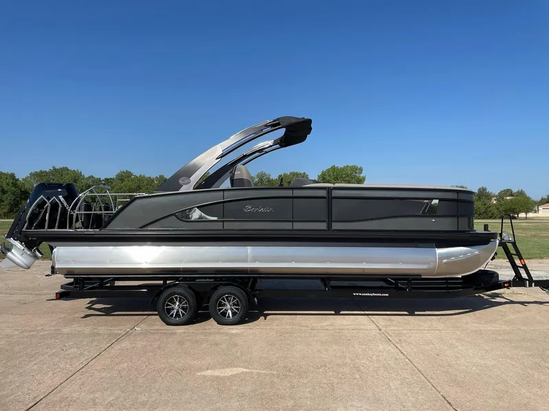 Slide: The Image of 2024 Barletta Lusso 25UCA pontoon boat on a trailer, side view. - 10