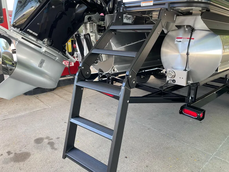 Slide: The Image of 2024 Barletta Lusso 25UCA pontoon boat with ladder and motor. - 19