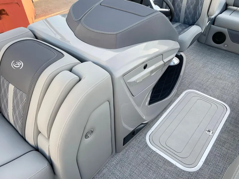 Slide: The Image of 2024 Barletta Lusso 25UCA luxury boat interior with premium seating and storage compartments. - 25