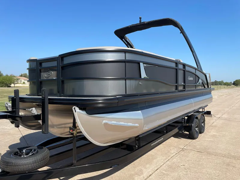 Slide: The Image of 2024 Barletta Lusso 25UCA pontoon boat on a trailer. - 3