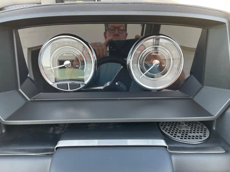 Slide: The Image of 2024 Barletta Lusso 25UCA dashboard with dual analog gauges. - 30