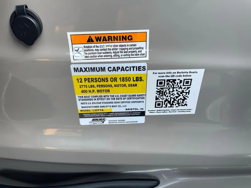 Slide: The Image of 2024 Barletta Lusso 25UCA capacity label: 12 persons or 1850 lbs, 400 HP motor. - 33