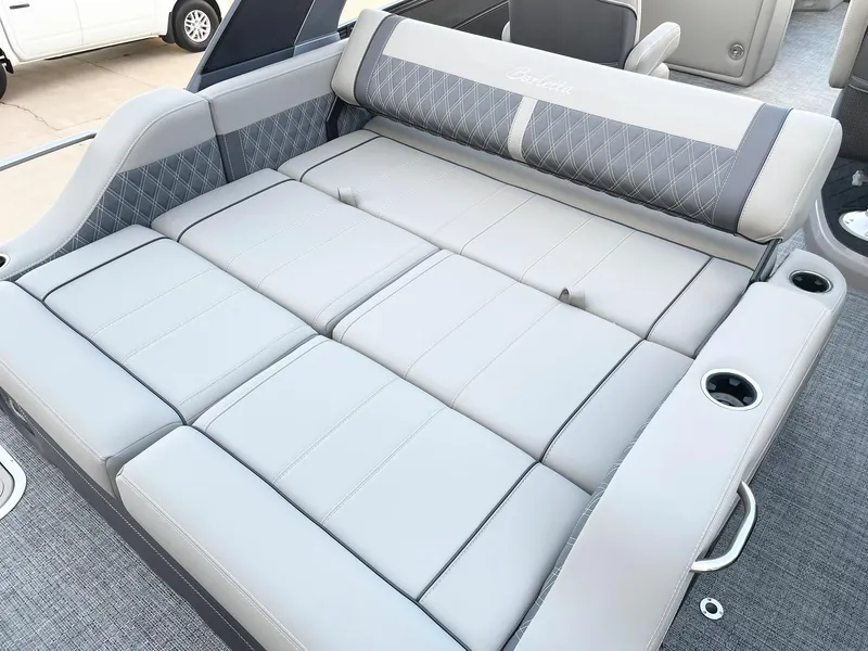 Slide: The Image of 2024 Barletta Lusso 25UCA luxury boat seating with gray upholstery and cup holders. - 36