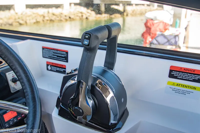 Slide: The Image of Throttle control of 2023 NX Boats 290 Exclusive Edition, featuring modern design and functionality. - 24