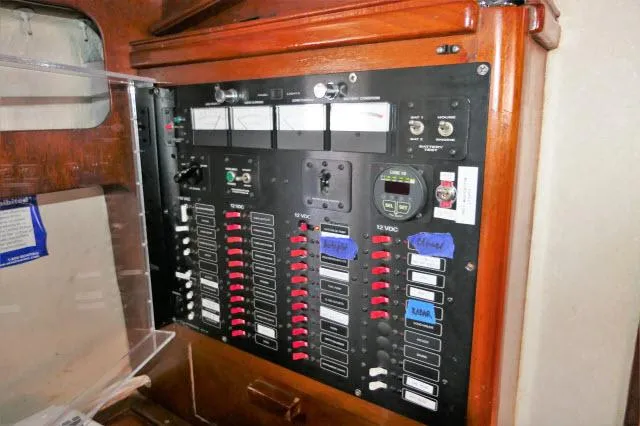 Slide: The Image of Electrical control panel of a 1979 Roberts 54 boat. - 16