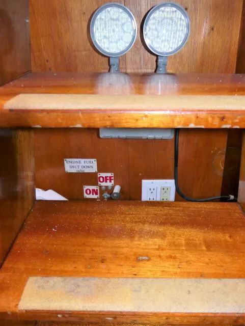 Slide: The Image of Vintage Roberts 54 boat interior with wooden shelves and dual lights, 1979 model. - 29