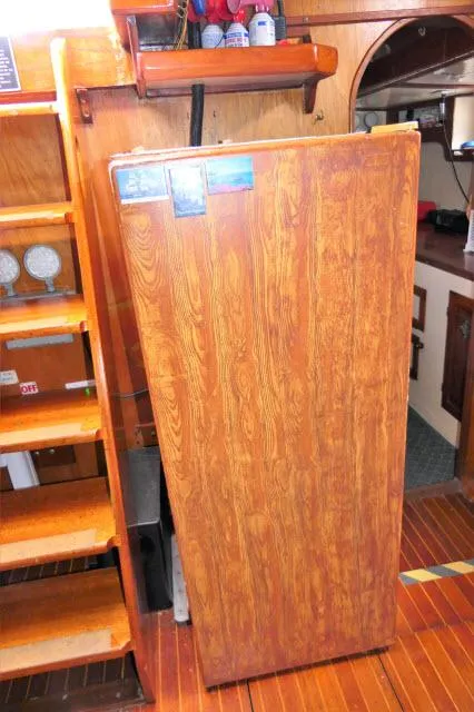 Slide: The Image of 1979 Roberts 54 interior with wooden cabinetry and stairs. - 6