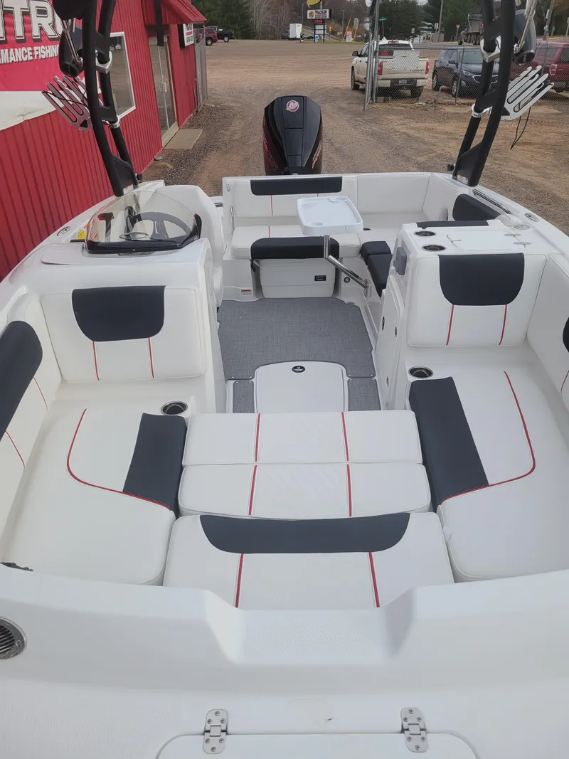 Slide: The Image of 2024 Tahoe 1950 boat with spacious seating and modern design. - 6