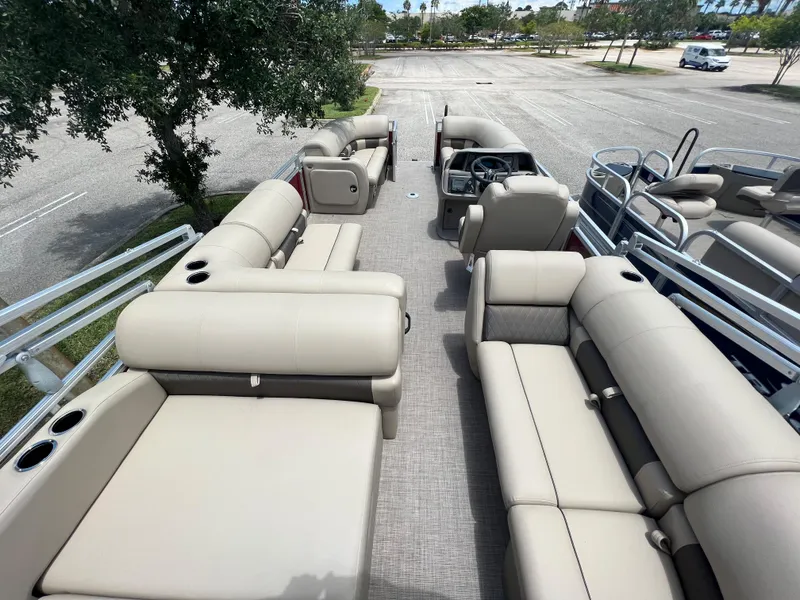 Slide: The Image of 2024 Sun Tracker Party Barge 22 RF DLX interior with spacious seating and modern design. - 6