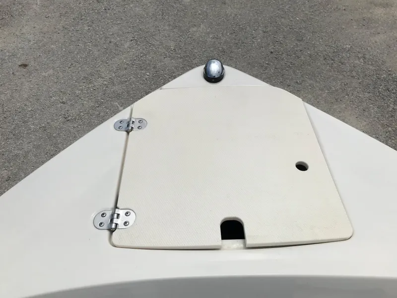 Slide: The Image of 2010 Monterey 214FS boat bow with storage compartment. - 13