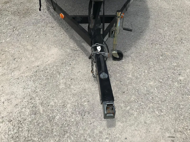 Slide: The Image of 2010 Monterey 214FS boat trailer hitch on concrete surface. - 33