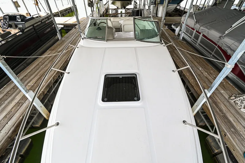 Slide: The Image of 2001 Sea Ray 260 Sundancer boat docked, top deck view. - 20