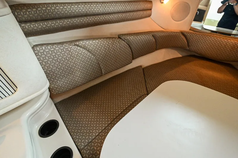 Slide: The Image of Interior cabin seating of a 2001 Sea Ray 260 Sundancer boat. - 29