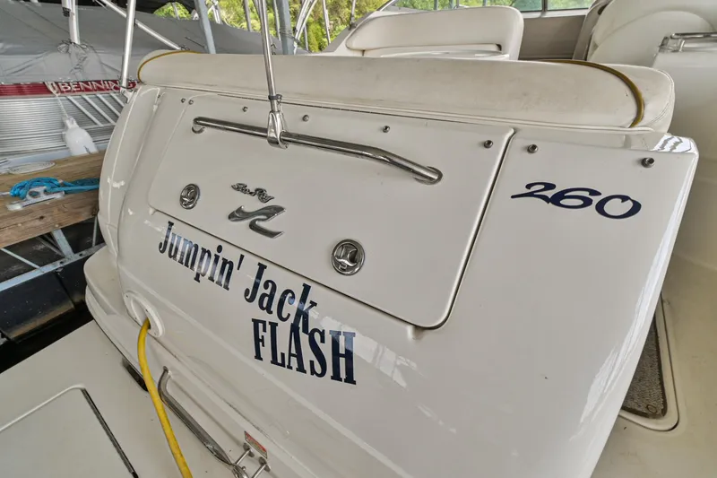 Slide: The Image of 2001 Sea Ray 260 Sundancer boat named Jumpin' Jack Flash docked. - 5