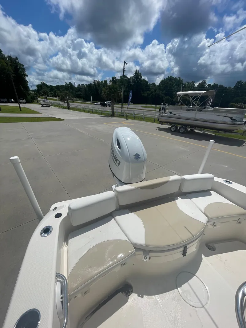 Slide: The Image of 2021 Bulls Bay 200 CC boat with outboard motor on a sunny day. - 8