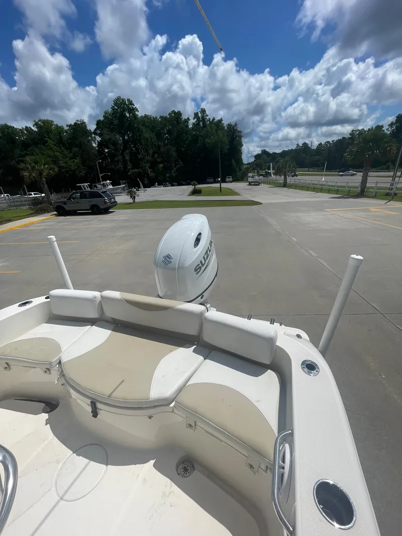 Slide: The Image of 2021 Bulls Bay 200 CC boat with Suzuki outboard motor in parking lot. - 9