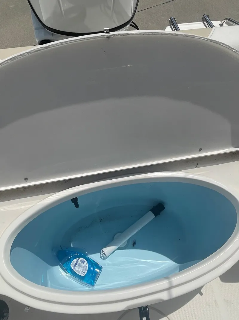 Slide: The Image of 2021 Bulls Bay 200 CC livewell with cleaning supplies. - 15