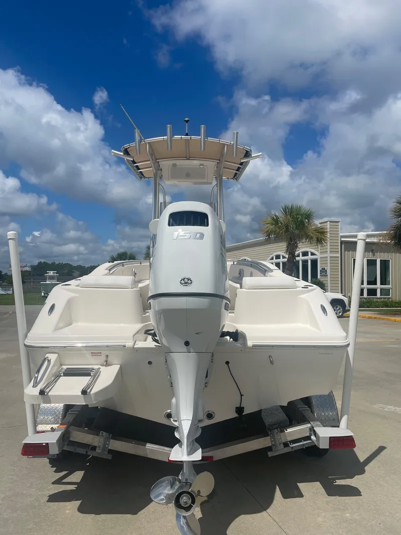 Slide: The Image of 2021 Bulls Bay 200 CC boat on trailer, rear view, under clear blue sky. - 5