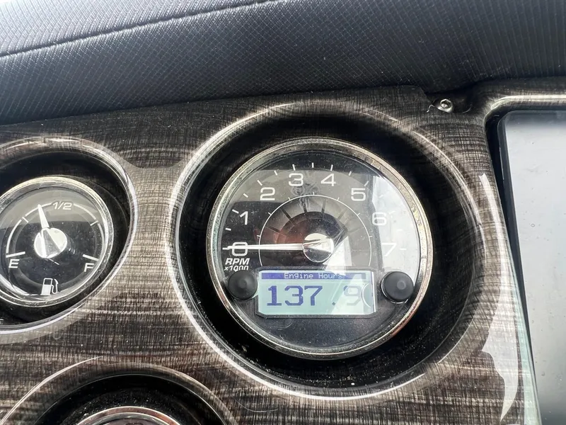 Slide: The Image of Close-up of 2019 Monterey 295 Sport Yacht dashboard gauges. - 5