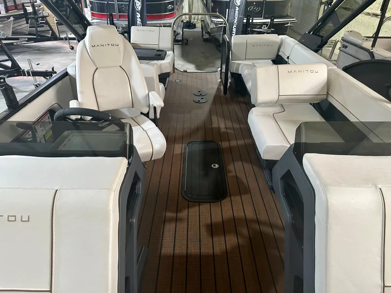 Slide: The Image of 2023 Manitou 26 Explore Switchback with Trifold Bench, luxury boat interior. - 7