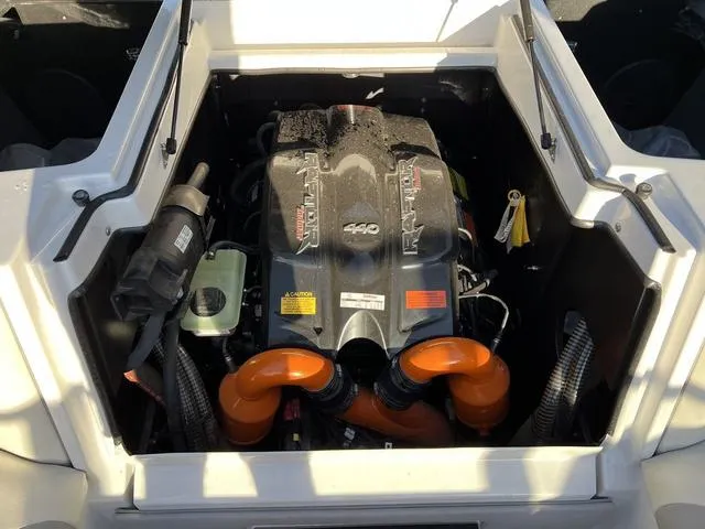 Slide: The Image of 2022 Tigé 23ZX boat engine compartment with Raptor 440 engine. - 12