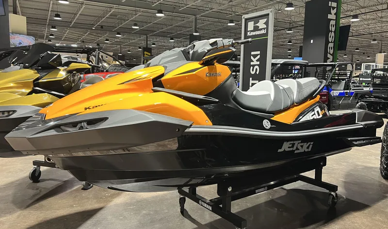 The Image of 2023 Sea-Doo JET SKI ULTRA 160 LX-S in showroom, orange and black. - 2