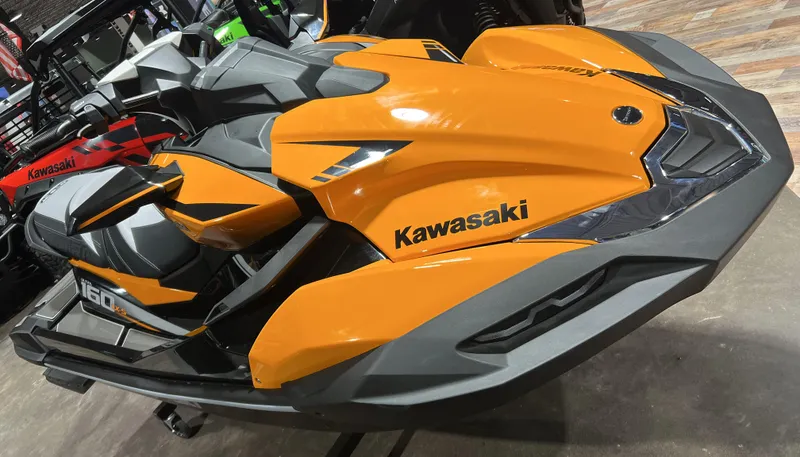 Slide: The Image of 2023 Sea-Doo JET SKI ULTRA 160 LX-S in vibrant orange and black. - 4