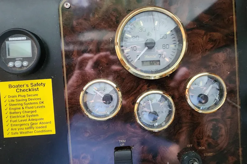 Slide: The Image of Dashboard of a 2007 Destination Yachts 16x58 with safety checklist. - 20