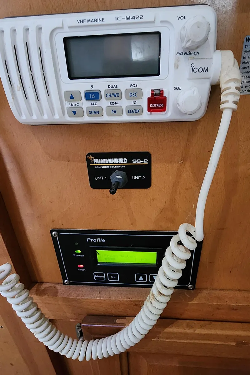 Slide: The Image of VHF Marine IC-M422 radio and Humminbird depth sounder on 2007 Destination Yachts 16x58. - 46