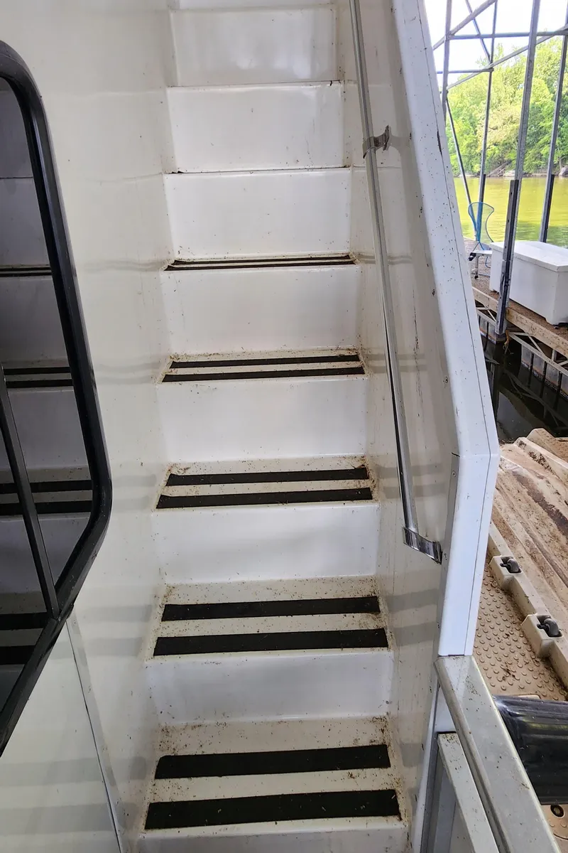 Slide: The Image of Staircase on a 2007 Destination Yachts 16x58 houseboat. - 9