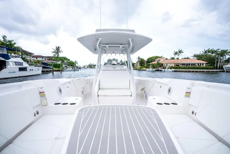 Slide: The Image of 2022 Intrepid 375 Nomad FE boat interior with waterfront view. - 22