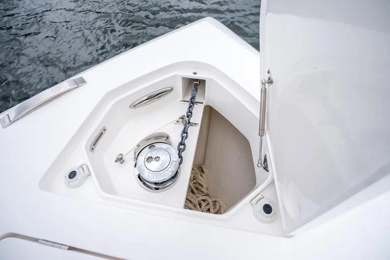 Slide: The Image of Anchor storage compartment on a 2022 Intrepid 375 Nomad FE boat. - 35